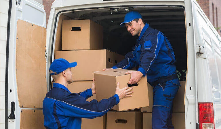 Delivery Drivers Unloading Van 99594318 Blog Hero 768X448